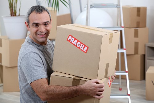 Man and van moving boxes near Barnsbury residential streets