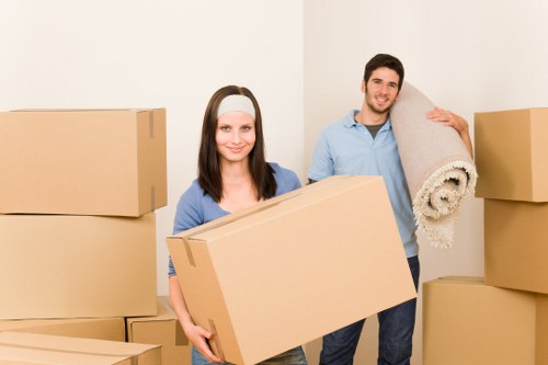 Careful removal of bulky sofas and tables from a local property