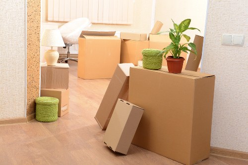 Packed furniture and labelled boxes ready for transport in Barnsbury