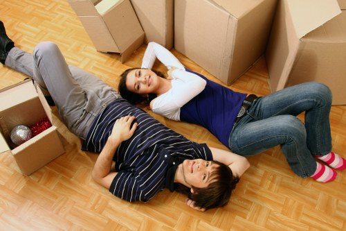 Careful unpacking of home essentials in a Barnsbury apartment